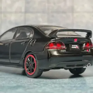 /img/50810-honda-diecast-model-display.webp